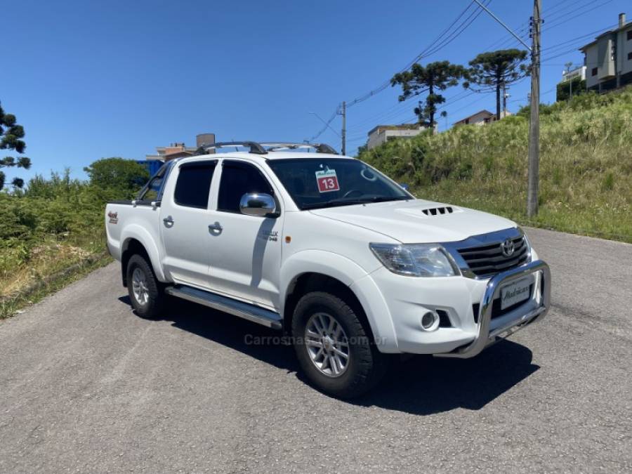 TOYOTA - HILUX - 2012/2013 - Branca - R$ 114.900,00